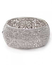 Nadri's curvaceously carved cuff shimmers and shines with cubic ziconia and crystal. Let this statement piece rule your wrist at elegant evening affairs. Nadri's curvaceously carved cuff shimmers and shines with cubic ziconia and crystal. Let this statement piece rule your wrist at elegant evening affairs.