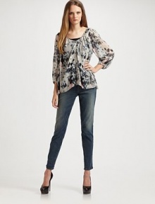 Beautifully tie-dyed silk billows around the body in a sheer blouson silhouette.Wide, horizontally ribbed elastic waistband Scoopneck Gathered pleats around the neckline Gathered sleeves Concealed snap-button placket Rolled hem About 24 from shoulder to hem Silk Dry clean Imported Beautifully tie-dyed silk billows around the body in a sheer blouson silhouette.Wide, horizontally ribbed elastic waistband Scoopneck Gathered pleats around the neckline Gathered sleeves Concealed snap-button placket Rolled hem About 24 from shoulder to hem Silk Dry clean Imported
