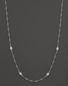 White sapphires sparkle on this intricate sterling silver necklace from Judith Ripka. White sapphires sparkle on this intricate sterling silver necklace from Judith Ripka.