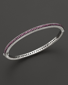 Pink sapphires stud a sterling silver bangle from Judith Ripka. Pink sapphires stud a sterling silver bangle from Judith Ripka.