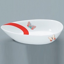 For over two centuries Raynaud has created unique Limoges porcelain, with a marked preference for relief shapes and generously colored and gilt decorations. Metamorphoses is a striking pattern of red and gold with a butterfly motif. For over two centuries Raynaud has created unique Limoges porcelain, with a marked preference for relief shapes and generously colored and gilt decorations. Metamorphoses is a striking pattern of red and gold with a butterfly motif.