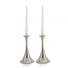 In the designer's own words, the Molten collection is distinguished by streamlined, timeless shapes... objects which reverberate with the skill of their maker and yet do not fit into a traditional interpretation of craft. The pieces possess a soulfulness and organic energy only possible through the handmade process. In the designer's own words, the Molten collection is distinguished by streamlined, timeless shapes... objects which reverberate with the skill of their maker and yet do not fit into a traditional interpretation of craft. The pieces possess a soulfulness and organic energy only possible through the handmade process.