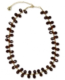 A casual-chic necklace in neutral hues from Jones New York. Clusters of brown resin beads are strung on a gold-tone linked chain. Crafted in worn gold tone mixed metal. Approximate length: 17 inches + 3-1/2-inch extender. A casual-chic necklace in neutral hues from Jones New York. Clusters of brown resin beads are strung on a gold-tone linked chain. Crafted in worn gold tone mixed metal. Approximate length: 17 inches + 3-1/2-inch extender.