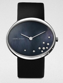 From the Vivianna Collection. A stunning, diamond detailed timepiece based on the brand's philosophy to meld design and functionality. Quartz movementWater resistant to 3 ATMRound stainless steel case, 40mm (1.6)Smooth bezel and black mother-of-pearl dial with diamond accents, .09 tcwInterchangeable black calfskin leather strap and black satin strapMade in Switzerland From the Vivianna Collection. A stunning, diamond detailed timepiece based on the brand's philosophy to meld design and functionality. Quartz movementWater resistant to 3 ATMRound stainless steel case, 40mm (1.6)Smooth bezel and black mother-of-pearl dial with diamond accents, .09 tcwInterchangeable black calfskin leather strap and black satin strapMade in Switzerland