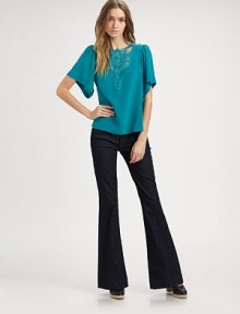 A supple silk sheath enhanced with a delicate lace inset for a hint of feminine charm.Jewel necklinePuffed shouldersAbout 23 from shoulder to hemSilkDry cleanMade in USA of imported fabric A supple silk sheath enhanced with a delicate lace inset for a hint of feminine charm.Jewel necklinePuffed shouldersAbout 23 from shoulder to hemSilkDry cleanMade in USA of imported fabric