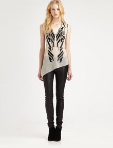 Contrasting appliqué and an asymmetrical hem give this lightweight tank a sophisticated makeover. Structured v-neckSleevelessAsymmetrical hemExposed back zipperPolyesterDry cleanMade in USA of Italian fabricModel shown is 5'10 (177cm) wearing US size Small. Contrasting appliqué and an asymmetrical hem give this lightweight tank a sophisticated makeover. Structured v-neckSleevelessAsymmetrical hemExposed back zipperPolyesterDry cleanMade in USA of Italian fabricModel shown is 5'10 (177cm) wearing US size Small.