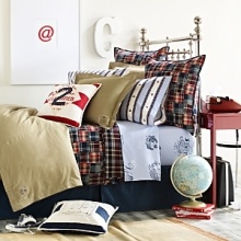 This youthful collection features elements appropriate for bedrooms, dorm rooms or first apartments. There is an irreverent feel to the printed sheeting, madras plaid quilt, khaki duvet, and many novelty accessories. This youthful collection features elements appropriate for bedrooms, dorm rooms or first apartments. There is an irreverent feel to the printed sheeting, madras plaid quilt, khaki duvet, and many novelty accessories.