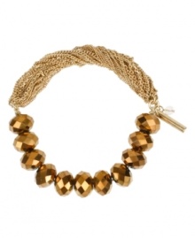 Fashion ripe for the picking! Kenneth Cole New York's half-stretch bracelet incorporates bronze tone cherry beads and gold tone chains. Bracelet stretches to fit wrist. Approximate length: 7-1/2 inches. Fashion ripe for the picking! Kenneth Cole New York's half-stretch bracelet incorporates bronze tone cherry beads and gold tone chains. Bracelet stretches to fit wrist. Approximate length: 7-1/2 inches.