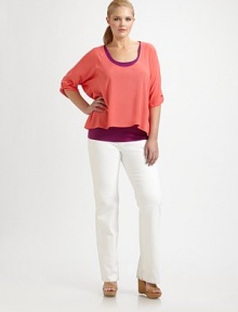 Offering a relaxed fit and an on-trend look, a vibrant design featuring a contrasting tank for a playful color-blocked effect.ScoopneckRoll-tab sleevesHigh-low hemAbout 27 from shoulder to hemRayon; tank: 47% pima cotton/47% modal/6% spandexDry cleanMade in USA Offering a relaxed fit and an on-trend look, a vibrant design featuring a contrasting tank for a playful color-blocked effect.ScoopneckRoll-tab sleevesHigh-low hemAbout 27 from shoulder to hemRayon; tank: 47% pima cotton/47% modal/6% spandexDry cleanMade in USA