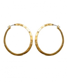 Hammered hoops make every day edgier. Kenneth Cole New York reinvents a classic with iridescent goldtone mixed metal and crystal accents. Approximate diameter: 3/4 inch. Hammered hoops make every day edgier. Kenneth Cole New York reinvents a classic with iridescent goldtone mixed metal and crystal accents. Approximate diameter: 3/4 inch.