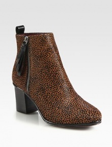 A daring animal print freshens this season's favorite silhouette, topped with an exposed zipper and patent leather trim. Stacked heel, 3 (75mm)Calf hair upper with patent leather trimExposed side zipLeather lining and solePadded insoleImported