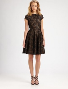 Delicate lace gives this feminine, full-skirted silhouette a romantic appeal.Gathered jewel necklineCap sleevesBack keyhole with button closureConcealed back zipFully linedAbout 26 from natural waistNylon/metallicDry cleanMade in USAModel shown is 5'10 (177cm) wearing US size 4. Delicate lace gives this feminine, full-skirted silhouette a romantic appeal.Gathered jewel necklineCap sleevesBack keyhole with button closureConcealed back zipFully linedAbout 26 from natural waistNylon/metallicDry cleanMade in USAModel shown is 5'10 (177cm) wearing US size 4.