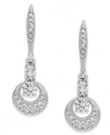 Don't drop the dazzle! Eliot Danori's elegant earrings feature intricate crystal accents and cubic zirconia (3/4 ct. t.w.) on circle drops. Set in rhodium-plated silver tone mixed metal. Approximate drop: 3/4 inch. Don't drop the dazzle! Eliot Danori's elegant earrings feature intricate crystal accents and cubic zirconia (3/4 ct. t.w.) on circle drops. Set in rhodium-plated silver tone mixed metal. Approximate drop: 3/4 inch.