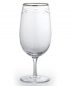 Commemorate a special anniversary with a simply elegant reminder of the time you said, I do. This radiant crystal iced beverage glass is hand-engraved with interlocking bands that symbolize the rings exchanged between bride and groom. A platinum rim provides a graceful finish.