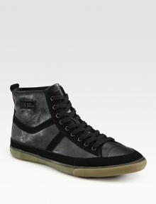 Sporty design with an edgy, downtown attitude in tonal leather and suede.Leather liningPadded insoleRubber soleImported Sporty design with an edgy, downtown attitude in tonal leather and suede.Leather liningPadded insoleRubber soleImported