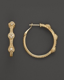 18K gold hoops sparkle with round diamond pave stations. By Judith Ripka. 18K gold hoops sparkle with round diamond pave stations. By Judith Ripka.