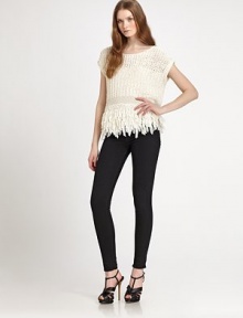 Chunky, open-weave knit, in a boxy silhouette finished with a wonderfully textural fringe hemline.Jewel necklineDolman cap sleevesKnotted fringe hemlineAbout 20 from shoulder to hem55% cotton/45% polyesterDry cleanImportedModel shown is 5'10½ (179cm) wearing US size Small. Chunky, open-weave knit, in a boxy silhouette finished with a wonderfully textural fringe hemline.Jewel necklineDolman cap sleevesKnotted fringe hemlineAbout 20 from shoulder to hem55% cotton/45% polyesterDry cleanImportedModel shown is 5'10½ (179cm) wearing US size Small.