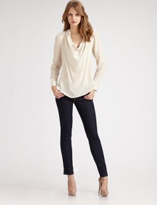 Delicate gathers and strategic pleating shape this beautifully draped silk design.Band collar Cowlneck Long dolman sleeves with pleated shoulders Button cuffs About 28 from shoulder to hem Silk Dry clean ImportedModel shown is 5'11 (180cm) wearing US size Small. Delicate gathers and strategic pleating shape this beautifully draped silk design.Band collar Cowlneck Long dolman sleeves with pleated shoulders Button cuffs About 28 from shoulder to hem Silk Dry clean ImportedModel shown is 5'11 (180cm) wearing US size Small.