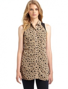 THE LOOKDraped patterned overlay topShirt collarSleevelessDraped at front placketSolid underlay peeks out at armsHi-lo hemTHE FITAbout 30 from shoulder to hemTHE MATERIALPolyesterCARE & ORIGINHand washImportedModel shown is 5'10 (177cm) wearing US size Small. THE LOOKDraped patterned overlay topShirt collarSleevelessDraped at front placketSolid underlay peeks out at armsHi-lo hemTHE FITAbout 30 from shoulder to hemTHE MATERIALPolyesterCARE & ORIGINHand washImportedModel shown is 5'10 (177cm) wearing US size Small.
