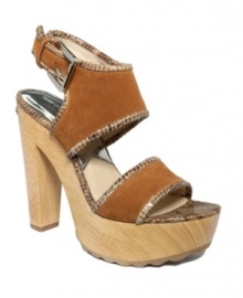 Delightfully chunky. MICHAEL by Michael Kors' Lily platform sandals feature a luxe suede upper with a cool animal print print trim. Delightfully chunky. MICHAEL by Michael Kors' Lily platform sandals feature a luxe suede upper with a cool animal print print trim.