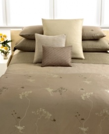 Nature inspired! This Sapling duvet cover from Calvin Klein Home creates a calming effect in your bedroom with muted floral designs over an earth tone landscape. Hidden button closure. Nature inspired! This Sapling duvet cover from Calvin Klein Home creates a calming effect in your bedroom with muted floral designs over an earth tone landscape. Hidden button closure.