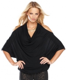 Dramatic cutouts and plenty of soft draping create a chic effect on INC's batwing-sleeve petite top! (Clearance) Dramatic cutouts and plenty of soft draping create a chic effect on INC's batwing-sleeve petite top! (Clearance)