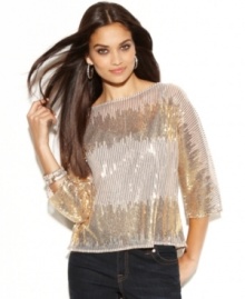 Shimmer and shine this spring with INC's glamorous sequined top! Try it with jeans and heels for a hot night-out combination. Shimmer and shine this spring with INC's glamorous sequined top! Try it with jeans and heels for a hot night-out combination.