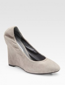 Soft stretch suede set atop a self-covered wedge and hidden platform. Self-covered wedge, 4 (100mm) Covered platform, ½ (15mm) Compares to a 3½ heel (90mm) Suede upper Leather lining Buffed leather sole Padded insole Imported Soft stretch suede set atop a self-covered wedge and hidden platform. Self-covered wedge, 4 (100mm) Covered platform, ½ (15mm) Compares to a 3½ heel (90mm) Suede upper Leather lining Buffed leather sole Padded insole Imported