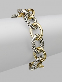 Extra large and extra lovely, this bold bracelet combines smooth 18k gold oval links with sterling silver cable links for a classic look with extra character. Sterling silver and 18k yellow gold Length, about 7½ Hidden spring clip clasp Made in USA Extra large and extra lovely, this bold bracelet combines smooth 18k gold oval links with sterling silver cable links for a classic look with extra character. Sterling silver and 18k yellow gold Length, about 7½ Hidden spring clip clasp Made in USA