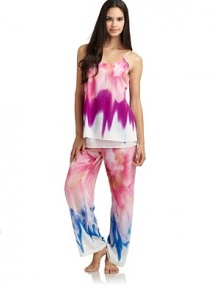 THE LOOKAllover abstract printShirt collarPatch pocket at chestButton closureCropped pants with drawstring waistTHE FITTop: about 26 from shoulder to hemPants: rise, about 11; inseam, about 25THE MATERIALPolyesterCARE & ORIGINMachine washImportedModel shown is 5'10 (177cm) wearing US size Small. THE LOOKAllover abstract printShirt collarPatch pocket at chestButton closureCropped pants with drawstring waistTHE FITTop: about 26 from shoulder to hemPants: rise, about 11; inseam, about 25THE MATERIALPolyesterCARE & ORIGINMachine washImportedModel shown is 5'10 (177cm) wearing US size Small.