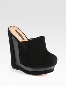 Soft suede design with wooden inserts and an architectural wedge and platform. Stacked suede and wooden wedge, 5¾ (145mm)Stacked platform, 1¾ (45mm)Compares to a 4 heel (100mm)Suede upperLeather lining and solePadded insoleImportedOUR FIT MODEL RECOMMENDS ordering one half size up as this style runs small. Soft suede design with wooden inserts and an architectural wedge and platform. Stacked suede and wooden wedge, 5¾ (145mm)Stacked platform, 1¾ (45mm)Compares to a 4 heel (100mm)Suede upperLeather lining and solePadded insoleImportedOUR FIT MODEL RECOMMENDS ordering one half size up as this style runs small.