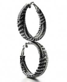 Practice contrast. A striking design made from braided black and white plastic vinyl make these Style&co. hoop earrings a fashionista's fave. Setting and lever clasp crafted in mixed metal. Approximate diameter: 2-1/2 inches. Practice contrast. A striking design made from braided black and white plastic vinyl make these Style&co. hoop earrings a fashionista's fave. Setting and lever clasp crafted in mixed metal. Approximate diameter: 2-1/2 inches.