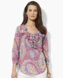 A beautifully bright paisley pattern lends breezy charm to Lauren by Ralph Lauren's top, designed in light-as-air cotton voile with puffed sleeves and voluminous ruffles for a graceful touch. A beautifully bright paisley pattern lends breezy charm to Lauren by Ralph Lauren's top, designed in light-as-air cotton voile with puffed sleeves and voluminous ruffles for a graceful touch.