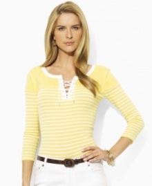 Bold nautical stripes and a scoop neckline with lace-up detailing lend chic seafaring style to a timeless tee in soft cotton, from Lauren Jeans Co. Bold nautical stripes and a scoop neckline with lace-up detailing lend chic seafaring style to a timeless tee in soft cotton, from Lauren Jeans Co.