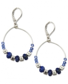 String together your perfect look with Jones New York. These darling hoops pop with blue and silver semi-precious and metal beads. Crafted in worn silver tone mixed metal. Approximate drop: 1-1/2 inches. Approximate diameter: 1 inch. String together your perfect look with Jones New York. These darling hoops pop with blue and silver semi-precious and metal beads. Crafted in worn silver tone mixed metal. Approximate drop: 1-1/2 inches. Approximate diameter: 1 inch.
