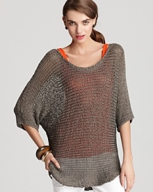 A sheer Vince sweater with reflective gold thread detail makes a glamorous fashion statement from the beach to the big city, endlessly chic with neutral-hued separates that off-set its gorgeous glow. Layer over a bold-colored tank for forward flair or keep the look neutral and choose a nude cami. A sheer Vince sweater with reflective gold thread detail makes a glamorous fashion statement from the beach to the big city, endlessly chic with neutral-hued separates that off-set its gorgeous glow. Layer over a bold-colored tank for forward flair or keep the look neutral and choose a nude cami.