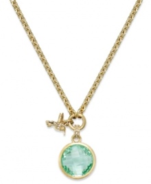 Hum a charming tune with this Juicy Couture charm necklace. A circular glass stone in shimmering green hues is paired with a hummingbird charm for a darling finishing touch. Crafted in gold tone mixed metal. Approximate length: 16 inches. Approximate drop: 1-1/2 inches. Hum a charming tune with this Juicy Couture charm necklace. A circular glass stone in shimmering green hues is paired with a hummingbird charm for a darling finishing touch. Crafted in gold tone mixed metal. Approximate length: 16 inches. Approximate drop: 1-1/2 inches.