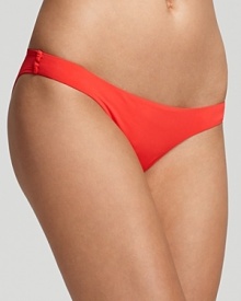 Whether at the pool or on the coast of Capri, Zimmerman's low bikini looks lush in a tropical hue. Whether at the pool or on the coast of Capri, Zimmerman's low bikini looks lush in a tropical hue.