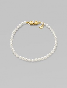 A strand of white cultured pearls with signature clasp closure.4mm white cultured pearls 18K yellow gold Length, about 7 Minuette clasp closure Imported A strand of white cultured pearls with signature clasp closure.4mm white cultured pearls 18K yellow gold Length, about 7 Minuette clasp closure Imported