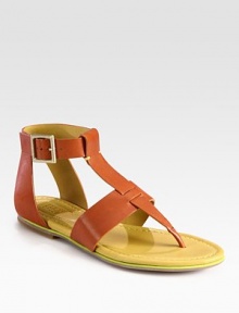 Luscious leather gladiator with a thong front and an adjustable ankle strap. Leather upperLeather liningRubber solePadded insoleImportedOUR FIT MODEL RECOMMENDS ordering true size. Luscious leather gladiator with a thong front and an adjustable ankle strap. Leather upperLeather liningRubber solePadded insoleImportedOUR FIT MODEL RECOMMENDS ordering true size.