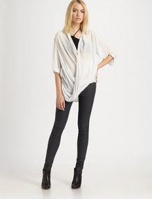 Ultra-sleek denim hugs the body like a second skin.THE FITUltra-slim fitRise, about 8Inseam, about 34THE DETAILSElastic waistbandMock zip flyFour-pocket style64% cotton/32% polyester/4% LycraDry cleanMade in USA of imported fabricModel shown is 5'9½ (177cm) wearing US size 4.OUR FIT MODEL RECOMMENDS ordering true size. Ultra-sleek denim hugs the body like a second skin.THE FITUltra-slim fitRise, about 8Inseam, about 34THE DETAILSElastic waistbandMock zip flyFour-pocket style64% cotton/32% polyester/4% LycraDry cleanMade in USA of imported fabricModel shown is 5'9½ (177cm) wearing US size 4.OUR FIT MODEL RECOMMENDS ordering true size.