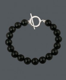 Bold style with a flair for the dramatic. Avalonia Road bracelet features round onyx beads (10 mm) with a sterling silver toggle clasp. Looks perfect when worn solo, or paired with other stackable bracelets. Approximate length: 7-1/2 inches. Bold style with a flair for the dramatic. Avalonia Road bracelet features round onyx beads (10 mm) with a sterling silver toggle clasp. Looks perfect when worn solo, or paired with other stackable bracelets. Approximate length: 7-1/2 inches.