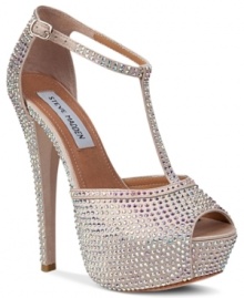 Sparkle with each step you take. Steve Madden's Angelina platform sandals are sweet and shimmery, the perfect going-out shoe. Sparkle with each step you take. Steve Madden's Angelina platform sandals are sweet and shimmery, the perfect going-out shoe.
