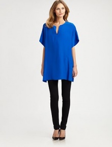 A simply gorgeous design made from matte silk. Its relaxed silhouette is perfectly complemented by split sides for an exquisite fit.Split neckElbow-length sleevesPull-on styleSide slitsAbout 31 from shoulder to hemSilkDry cleanImported Model shown is 5'10 (177cm) wearing US size Small. A simply gorgeous design made from matte silk. Its relaxed silhouette is perfectly complemented by split sides for an exquisite fit.Split neckElbow-length sleevesPull-on styleSide slitsAbout 31 from shoulder to hemSilkDry cleanImported Model shown is 5'10 (177cm) wearing US size Small.