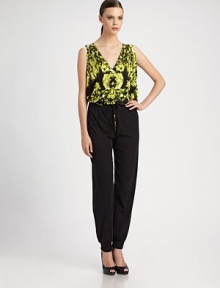 This loose-fitting, silky design is printed with a vibrant, abstracted floral pattern.V necklineSleevelessV back with strap detailViscoseDry cleanMade in ItalyModel shown is 5'9½ (176cm) wearing US size Small. This loose-fitting, silky design is printed with a vibrant, abstracted floral pattern.V necklineSleevelessV back with strap detailViscoseDry cleanMade in ItalyModel shown is 5'9½ (176cm) wearing US size Small.