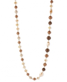Go to greater lengths. This necklace from Kenneth Cole New York is crafted from gold-tone mixed metal and features a stunning array of brown glass pearls and beads. Item comes packaged in a signature Kenneth Cole New York Gift Box. Approximate length: 43 inches. Approximate drop: 1/2 inch. Go to greater lengths. This necklace from Kenneth Cole New York is crafted from gold-tone mixed metal and features a stunning array of brown glass pearls and beads. Item comes packaged in a signature Kenneth Cole New York Gift Box. Approximate length: 43 inches. Approximate drop: 1/2 inch.