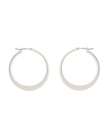Shimmery hoops with a modern spin. Kenneth Cole New York earrings feature a graduated hoop in silver tone mixed metal. Approximate diameter: 1-1/4 inches. Shimmery hoops with a modern spin. Kenneth Cole New York earrings feature a graduated hoop in silver tone mixed metal. Approximate diameter: 1-1/4 inches.