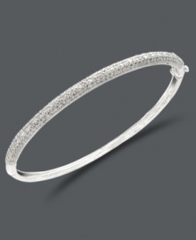 Slip a little luster over your wrist. This sparkling bangle by Victoria Townsend features a smooth sterling silver setting decorated with round-cut diamonds (1/4 ct. t.w.). Approximate diameter: 2-1/2 inches. Slip a little luster over your wrist. This sparkling bangle by Victoria Townsend features a smooth sterling silver setting decorated with round-cut diamonds (1/4 ct. t.w.). Approximate diameter: 2-1/2 inches.