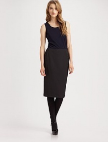 A jersey style that's the perfect layering piece. Scoopneck Sleeveless Pull-on style About 25 from shoulder to hem Wool Hand wash Imported A jersey style that's the perfect layering piece. Scoopneck Sleeveless Pull-on style About 25 from shoulder to hem Wool Hand wash Imported