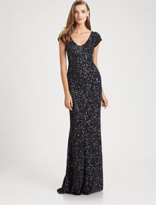 Allover beads and sequins create a dazzling effect on this festive, floor-length design.V necklineCap sleevesConcealed back zipFully linedAbout 61 from shoulder to hemNylonSpot cleanImportedModel shown is 5'11 (180cm) wearing US size 4. Allover beads and sequins create a dazzling effect on this festive, floor-length design.V necklineCap sleevesConcealed back zipFully linedAbout 61 from shoulder to hemNylonSpot cleanImportedModel shown is 5'11 (180cm) wearing US size 4.
